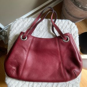 red small shoulder purse.